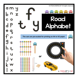 A colourful Road Alphabet activity sheet featuring a lowercase letter "a" designed as a road with a green dot at the start, an orange dot in the middle, and a red dot at the end, mimicking traffic lights. A laminated A3 sheet and a car stick figure on a lolly stick are shown, with a white background suitable for printing on yellow paper.